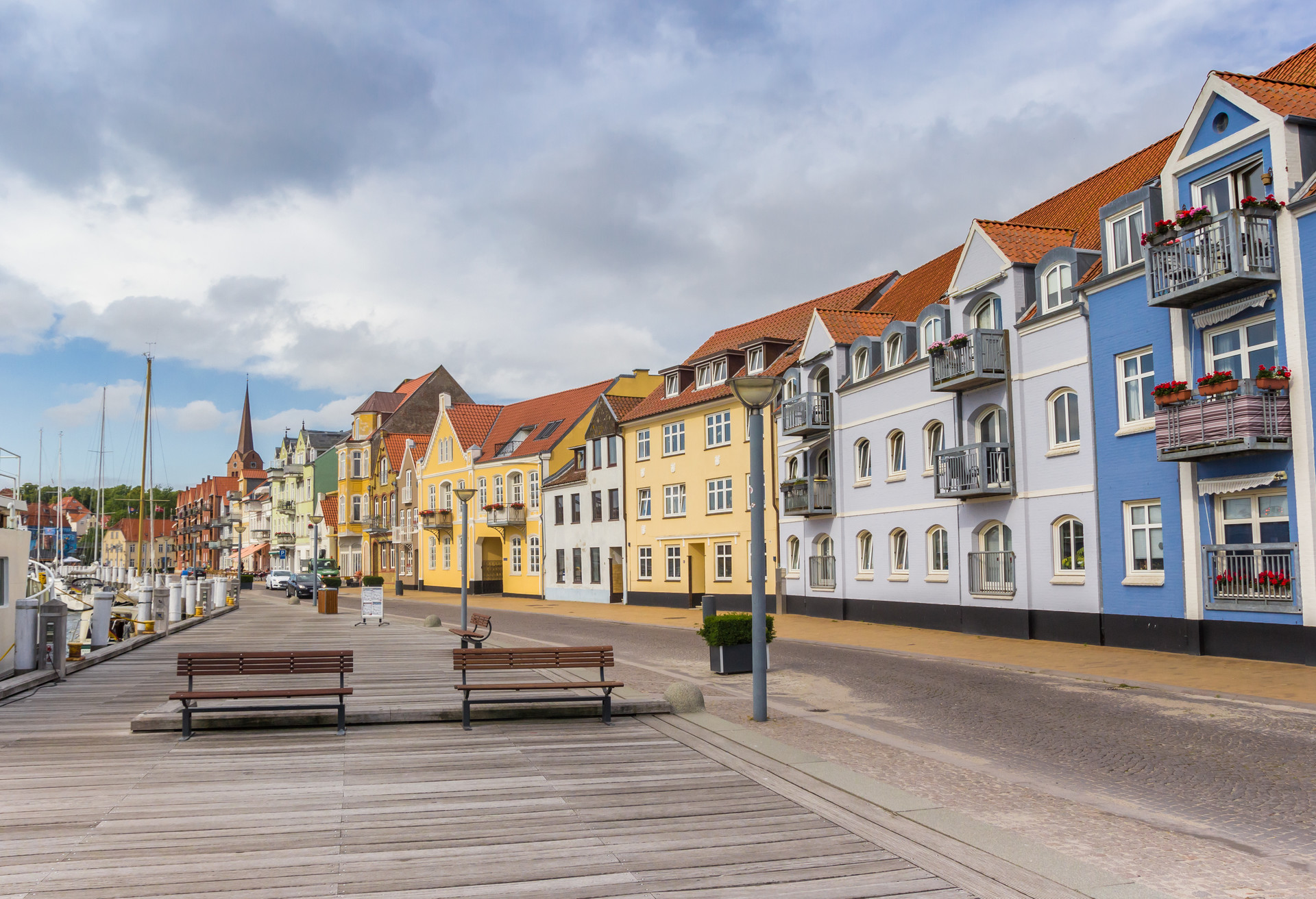 Benches at the wooden jetty in the harbor of Sonderborg, Denmark