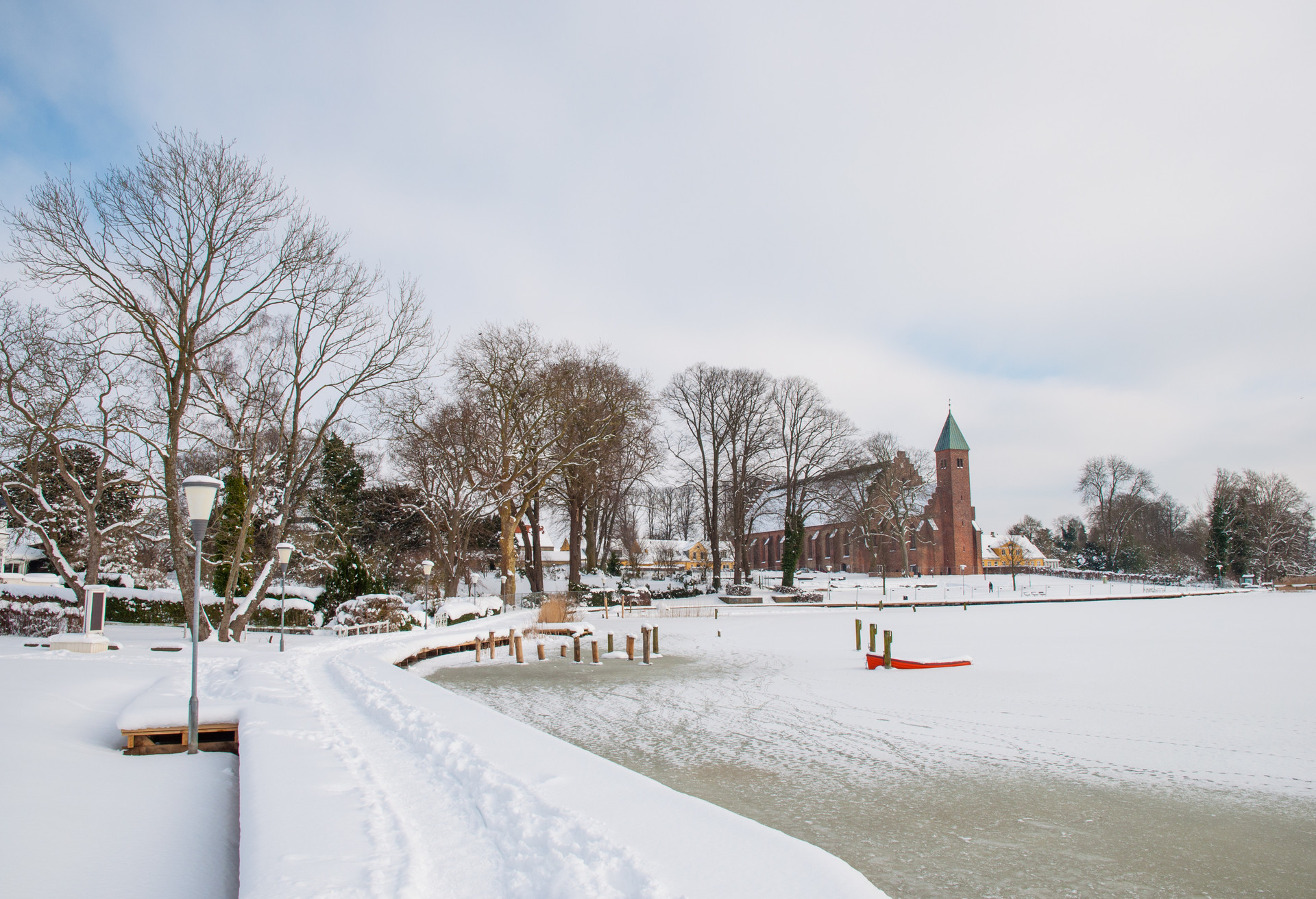 beautiful winter day by the lake in town of Maribo in Denmark