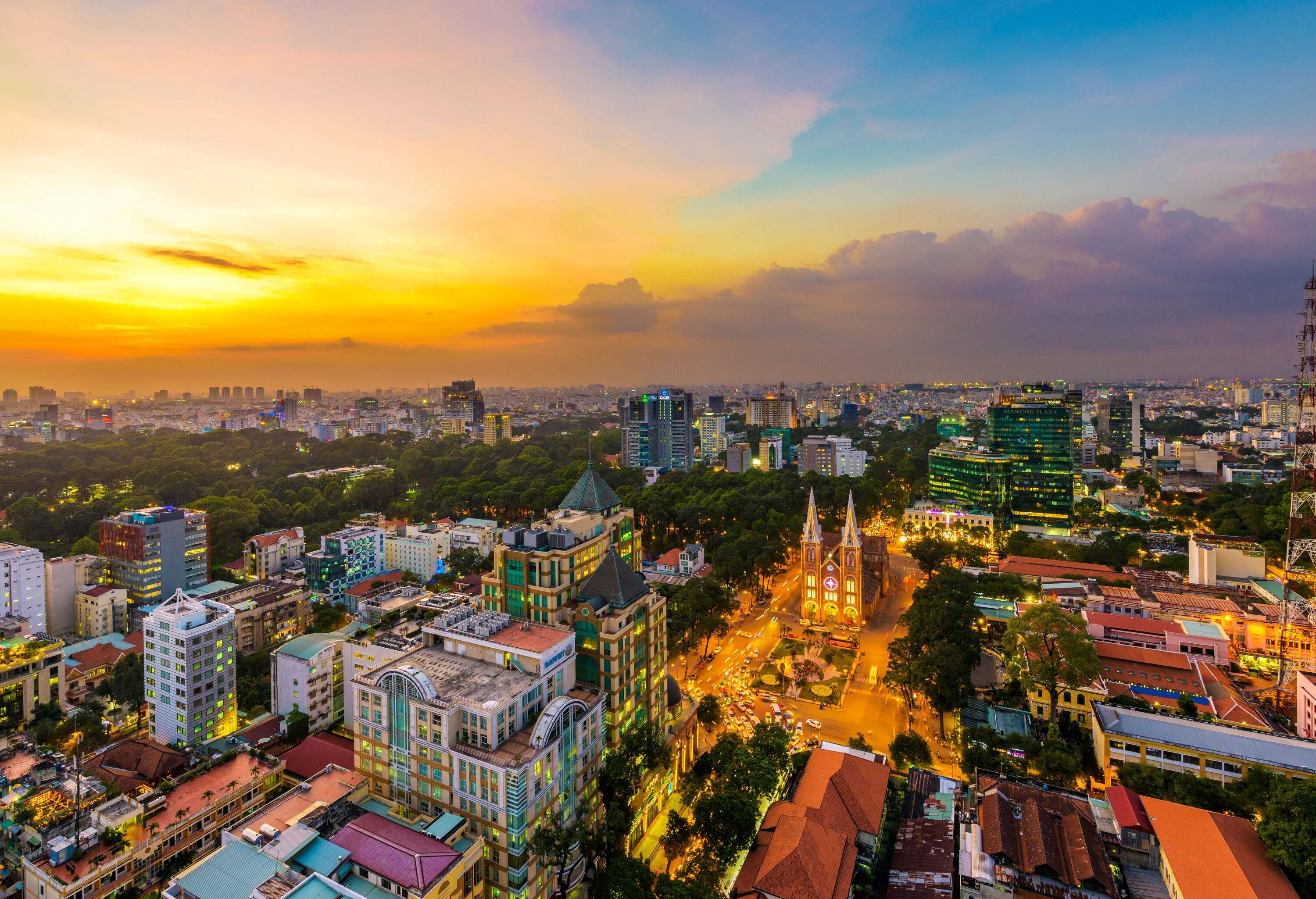Urban landscape of a dazzling city under the sunset skies.