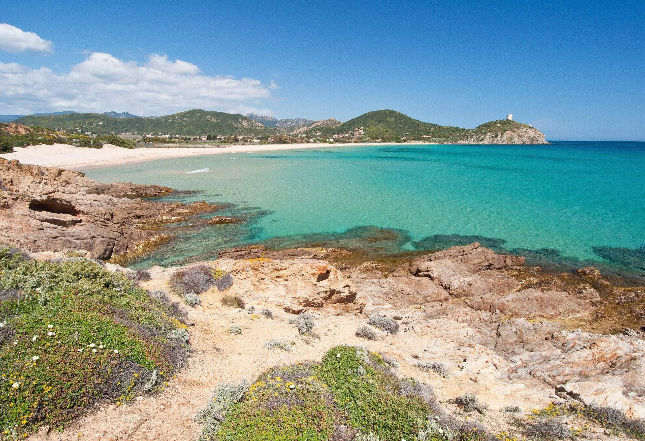 beach with white sand and crystal clear waters in Chia, south Sardinia, Italy