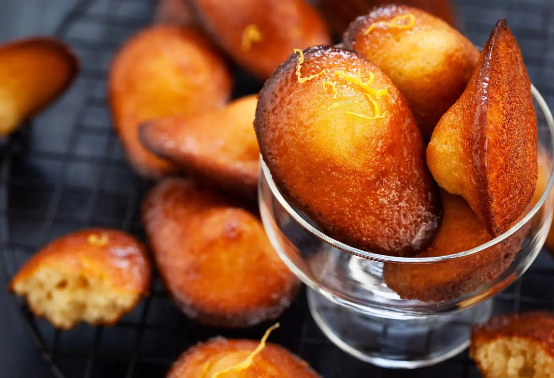 French Madeleines in a glass and on black underground