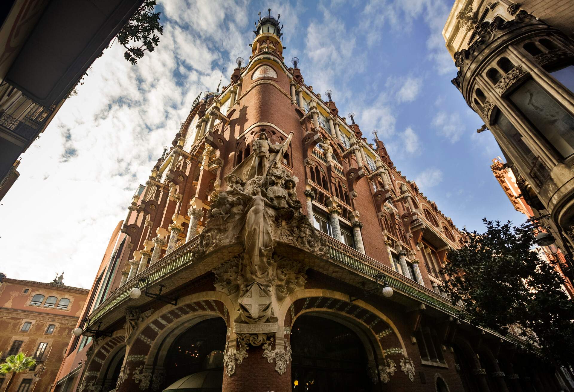 A richly decorated concert hall lies between the old buildings.