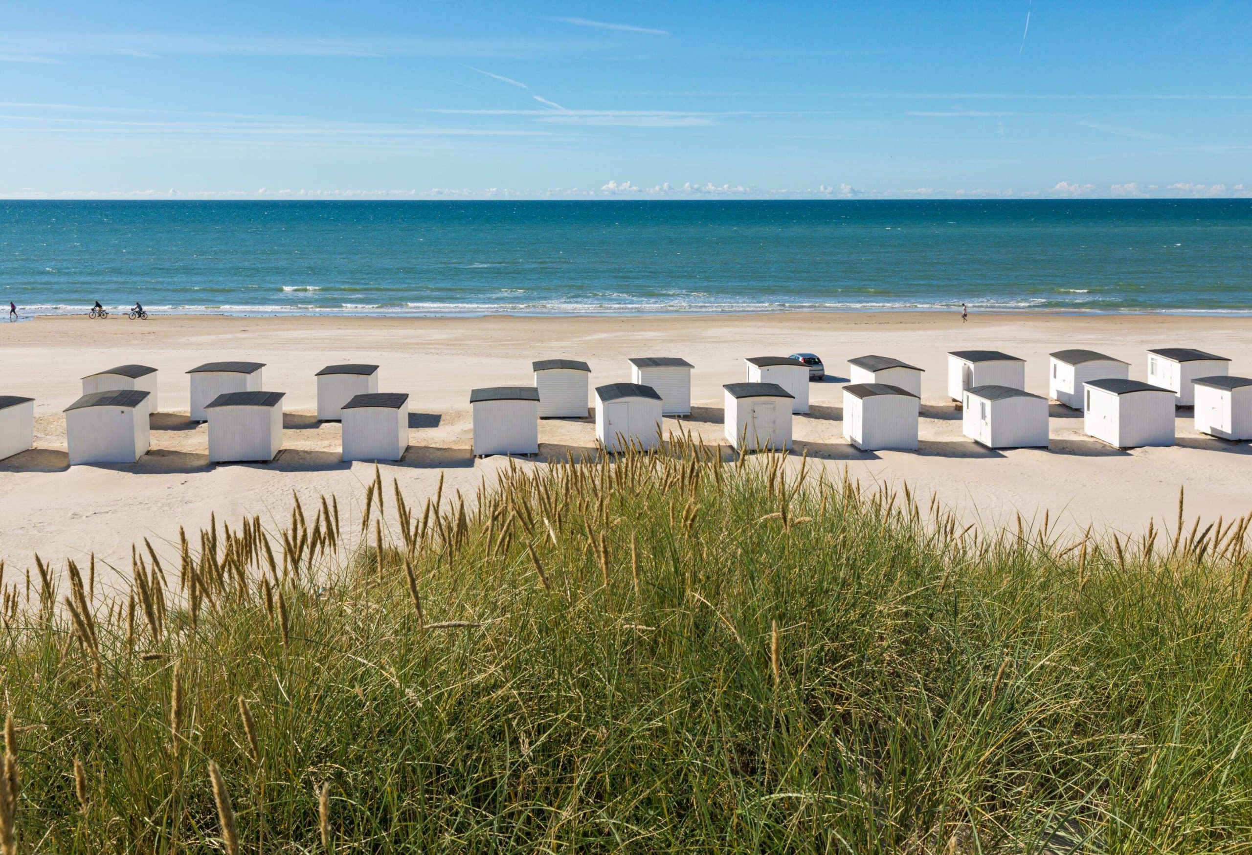 The beach of Løkken, Denmark, with it's rows of white wooden beach huts