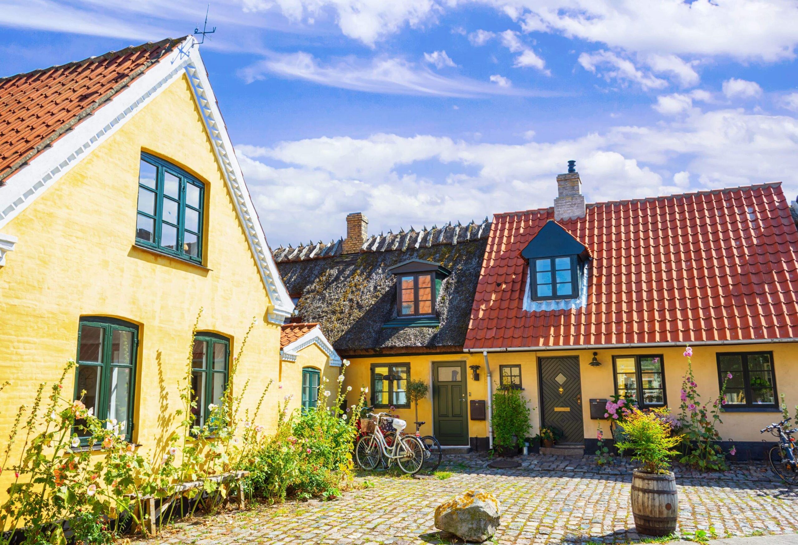 Small streets with beautiful, yellow old houses. Traditional Scandinavian houses.Dragor, Denmark. Architecture Attractions