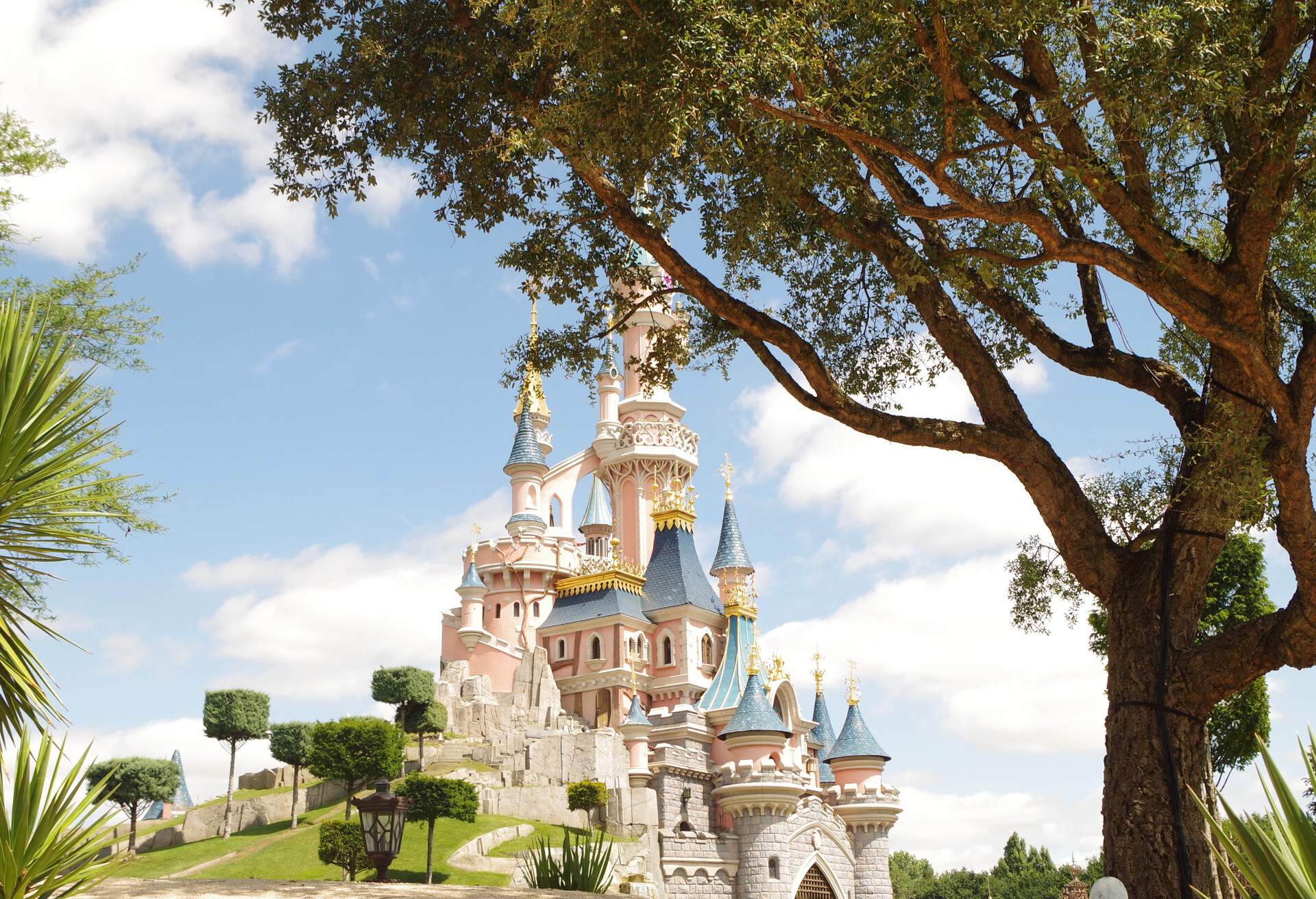 The Disney fairytale castle complete with its tiled roofs and elegant cornice.