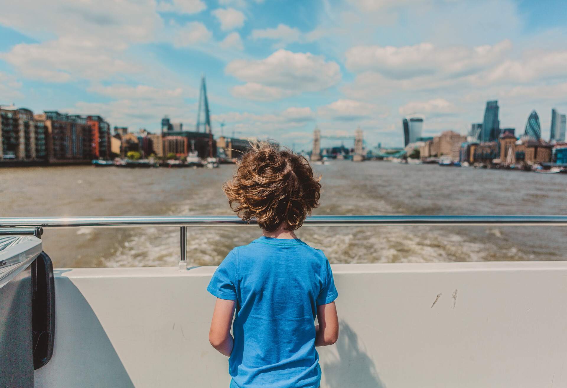 Child, boat, London, UK.