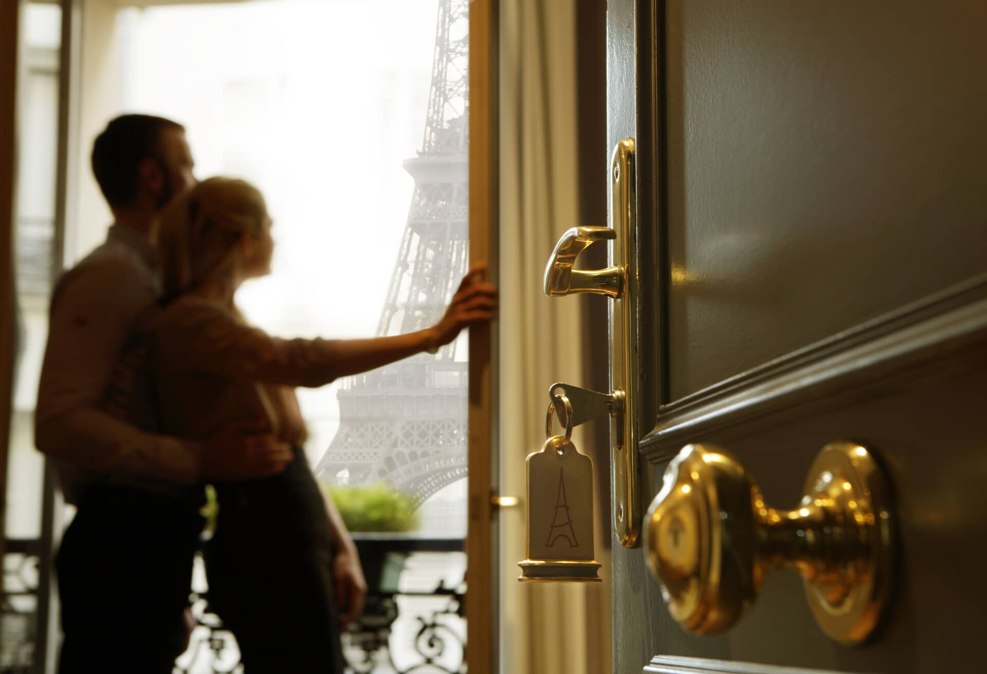 Paris Couple in the Hotel Window