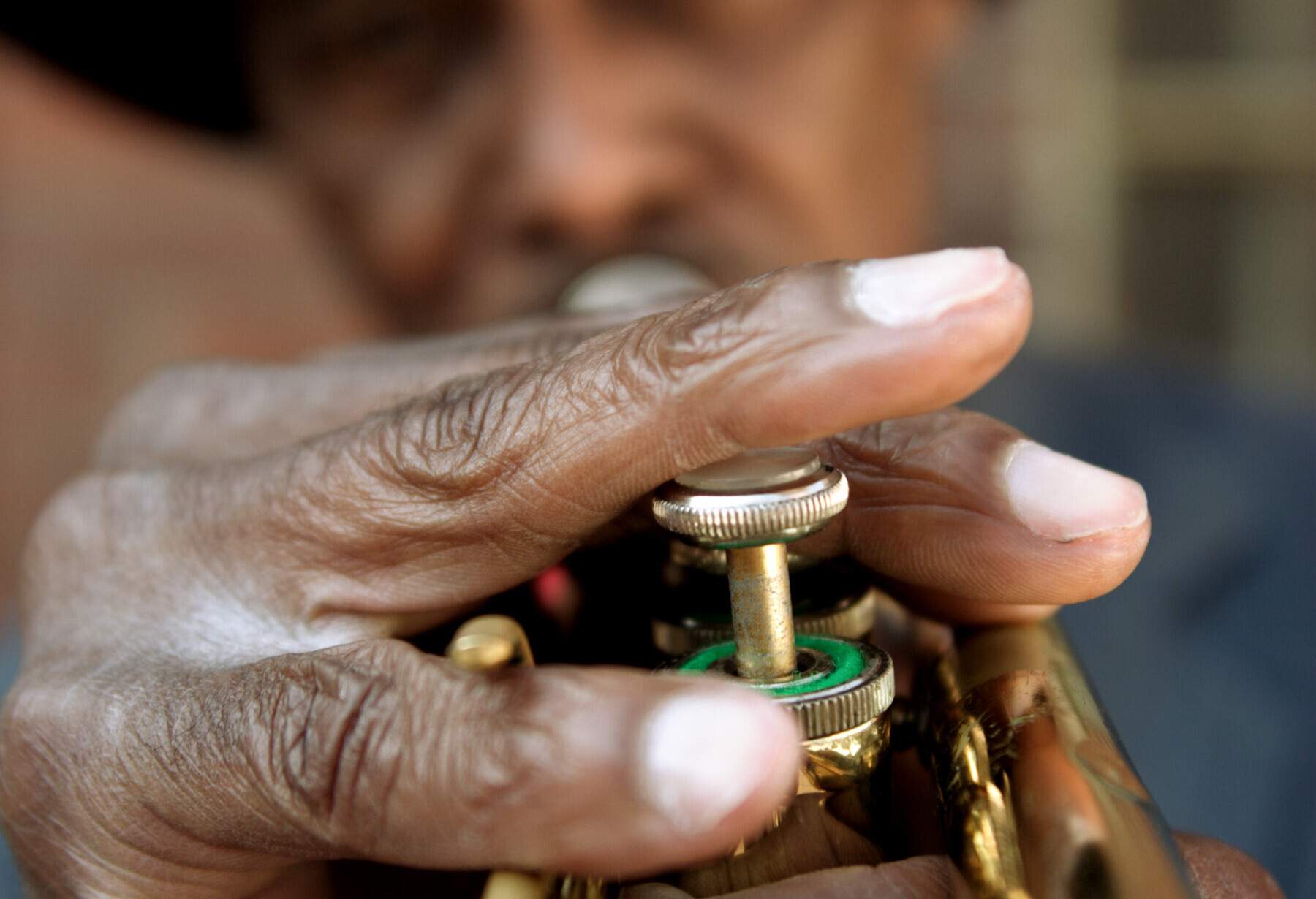 Close up of hand of jazz musician playing trumpet