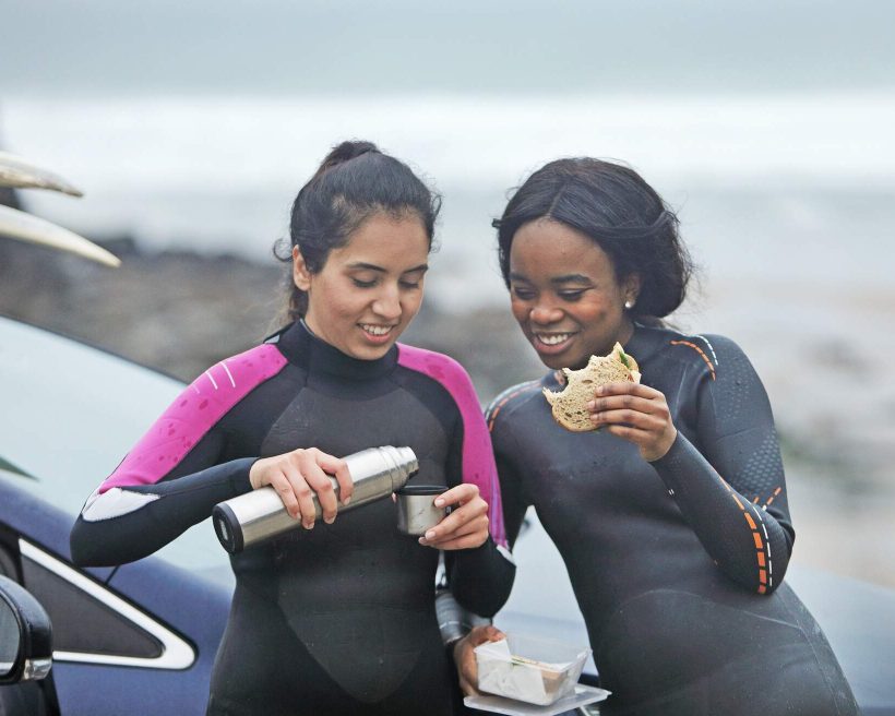 theme_car_people_gay_couple_friends_surf_food_gettyimages-1080959520_universal_within-usage-period_83071
