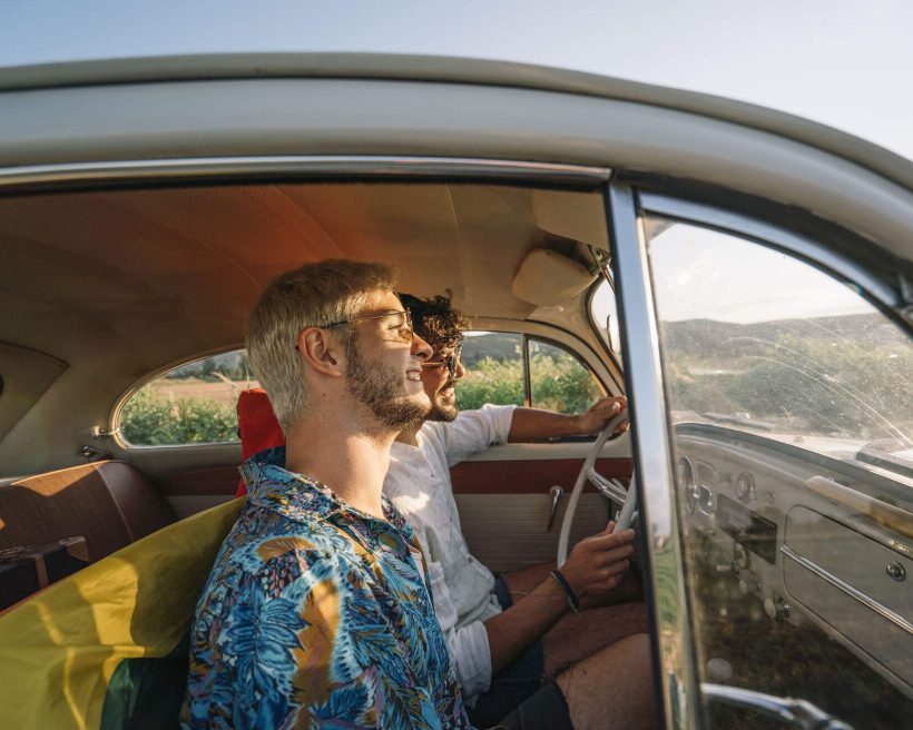 theme_car_people_gay_couple_gettyimages-1186567054_universal_within-usage-period_83072