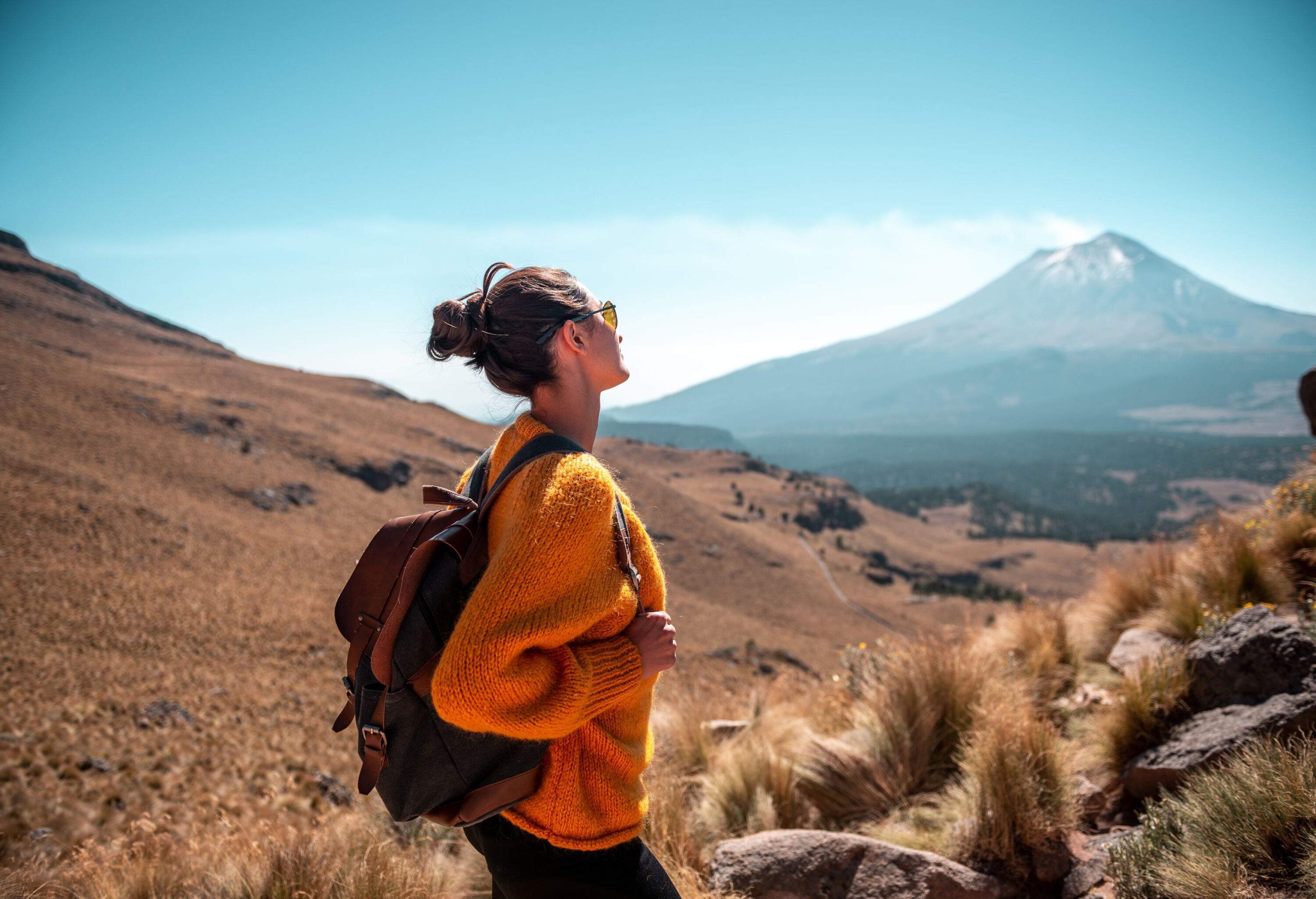 Young Latin woman enjoying the view to Popocatepetl volcano