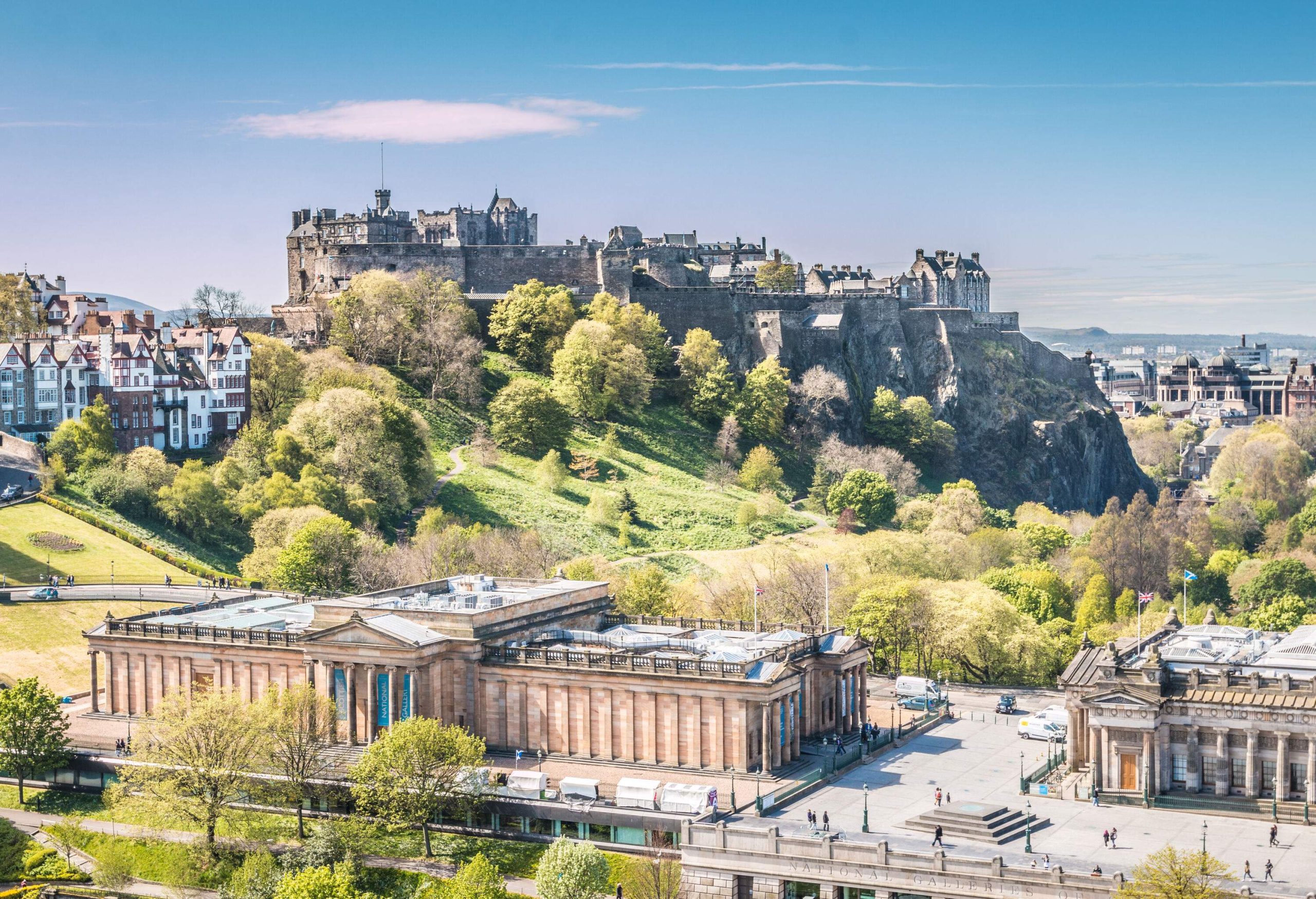 A hilltop castle overlooks the entire community and is surrounded by trees and a beautiful environment.