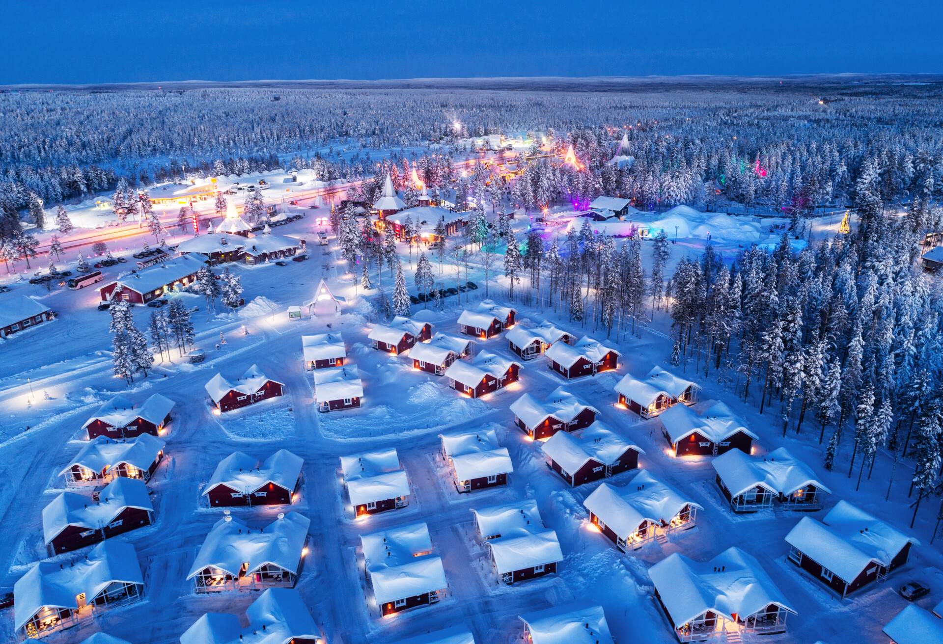 A quaint arctic village surrounded by trees.