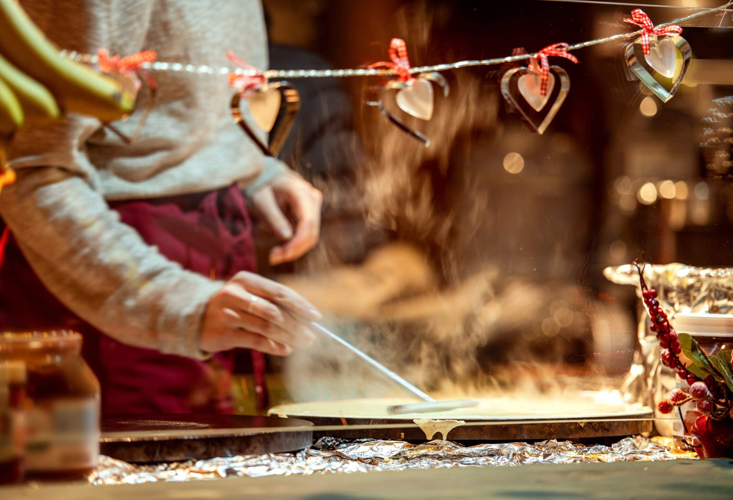 Market vendor making crepes at Christmas Market