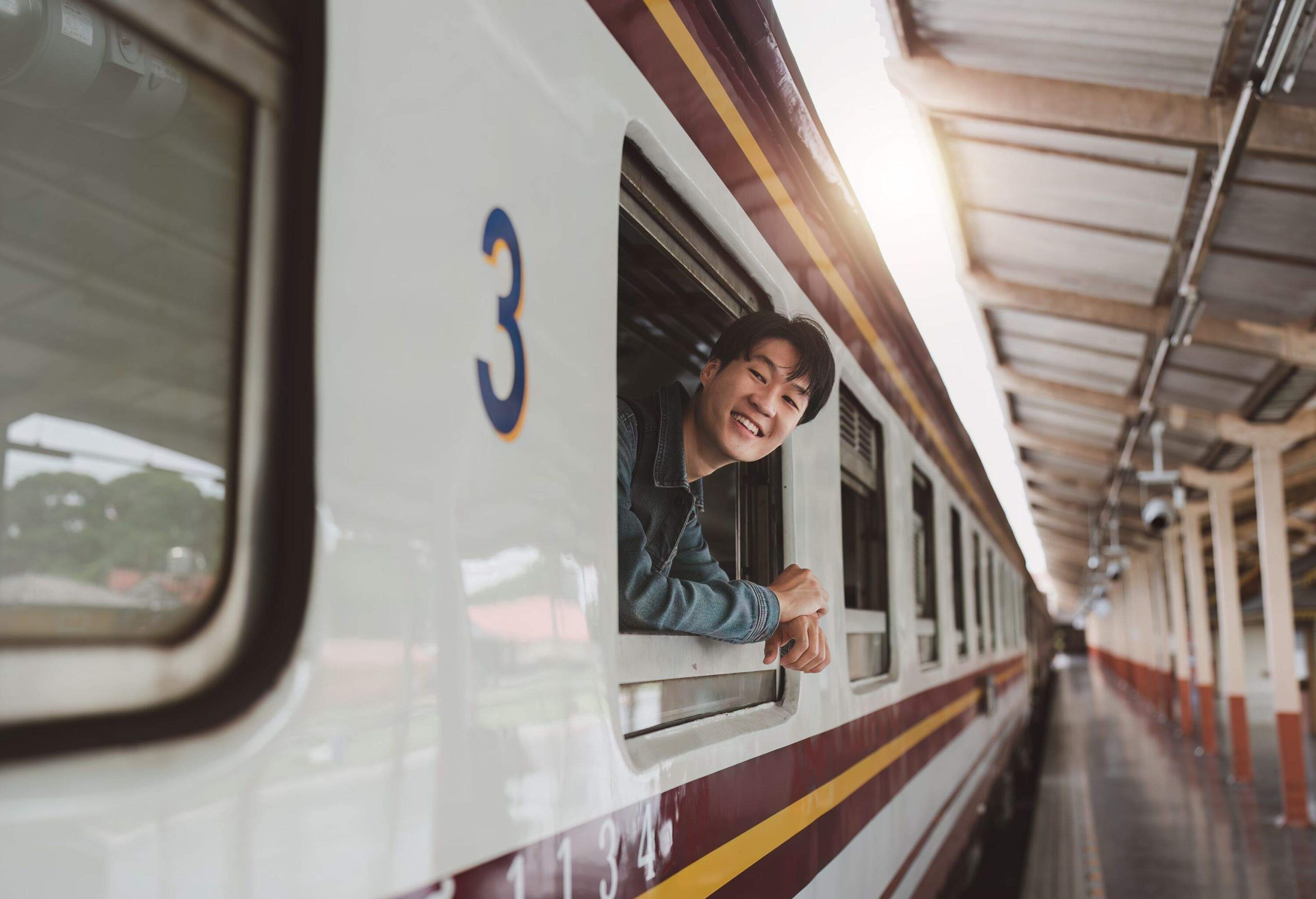 Asian Tourist person backpacker to travel at train station.