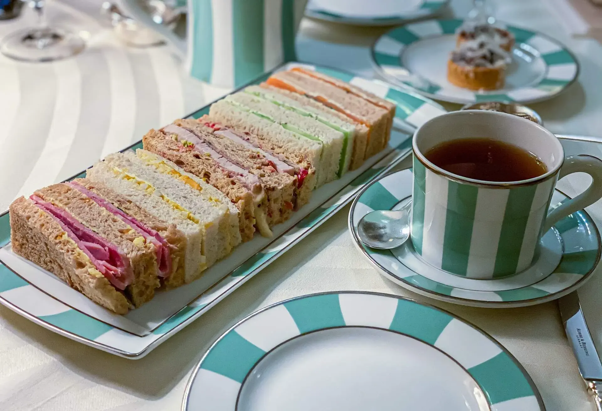 Variety of Sandwiches in small cuts and a good cup of tea to start the afternoon tea at Claridge's, London.