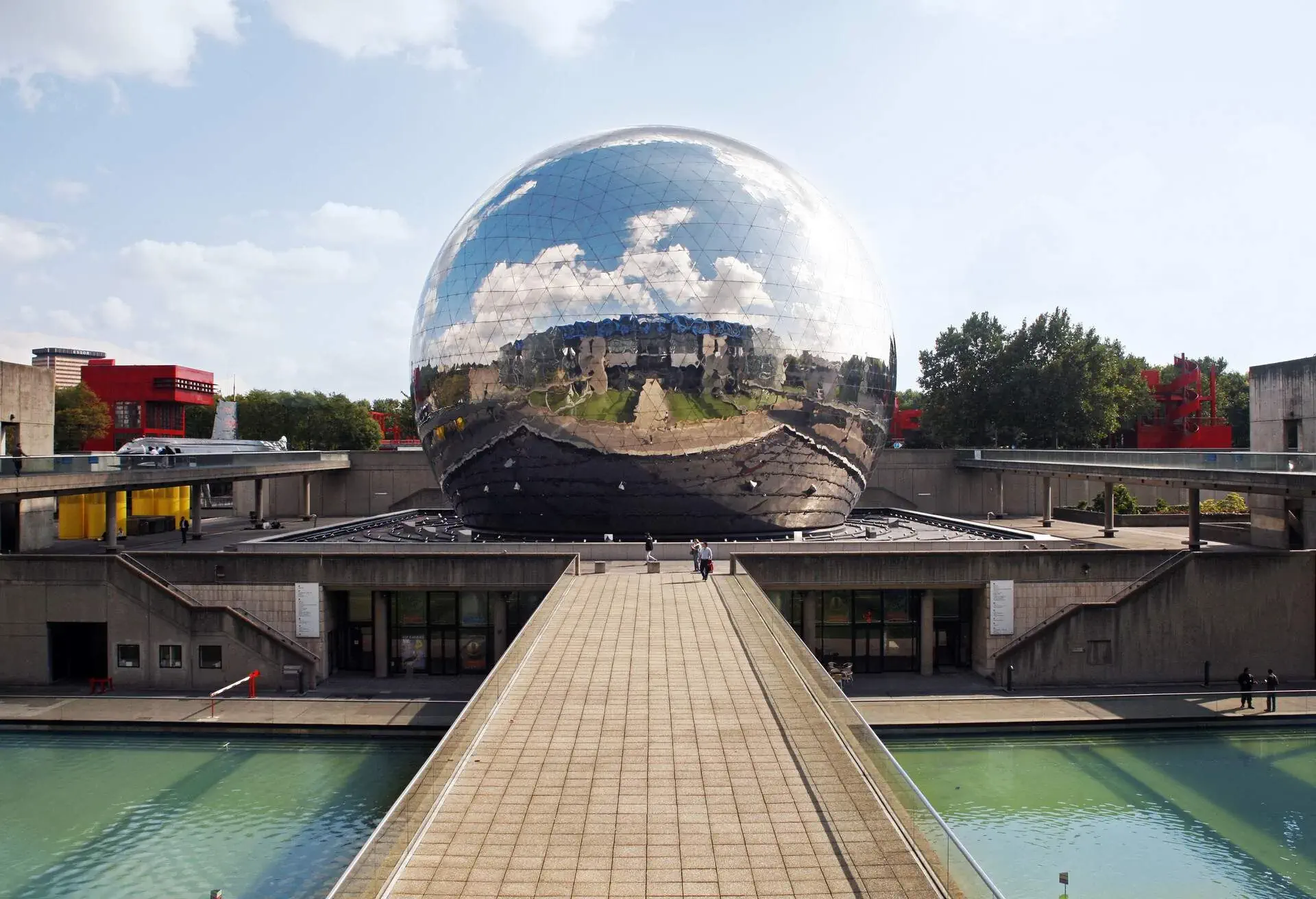 The La Géode's mirror finish reflecting the sky and its surroundings.