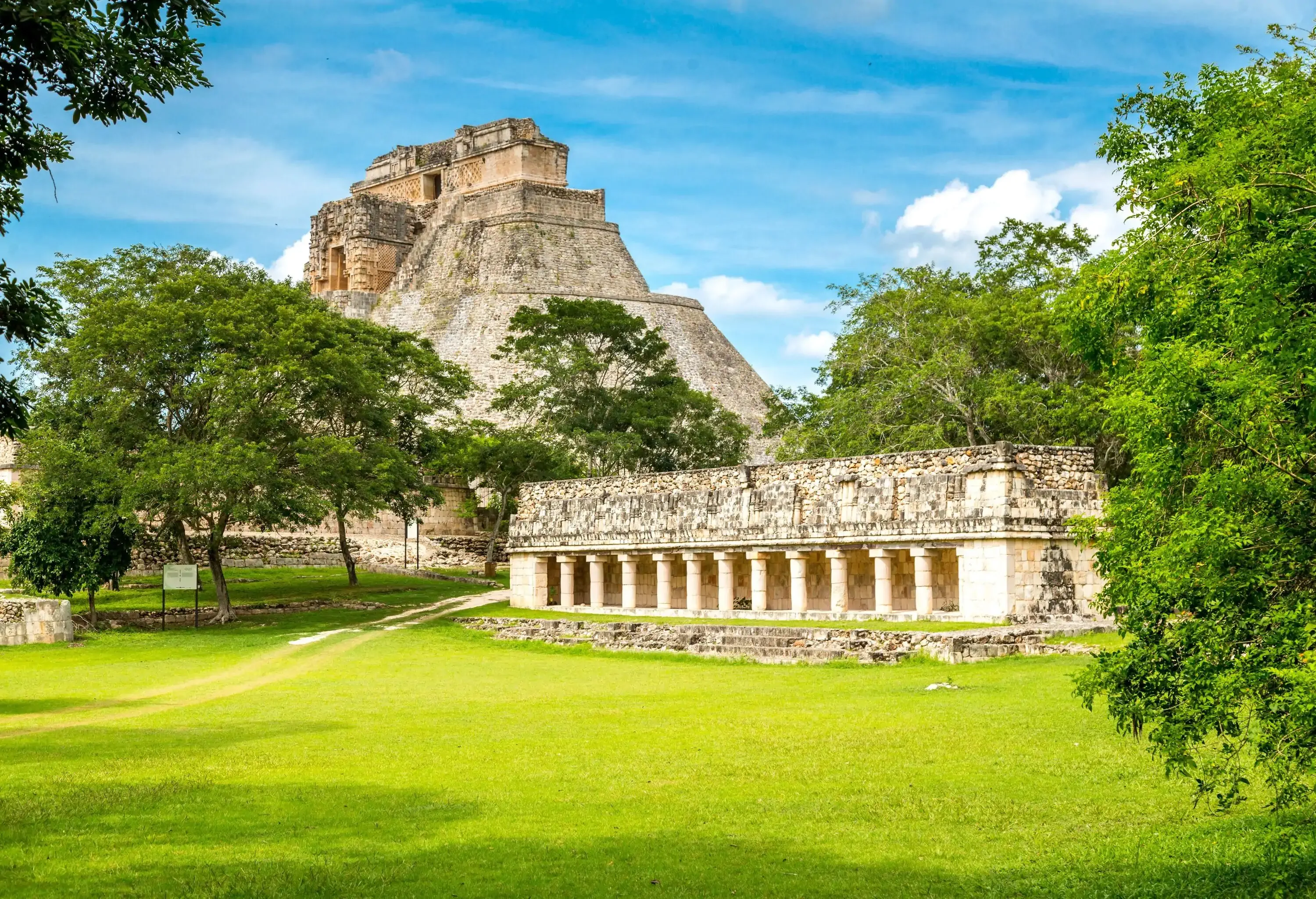The Pyramid of the Magician, an astonishing and towering edifice located within the ancient Maya metropolis, shows remarkable architectural design and detailed features that demonstrate the Maya people's superb workmanship and resourcefulness.