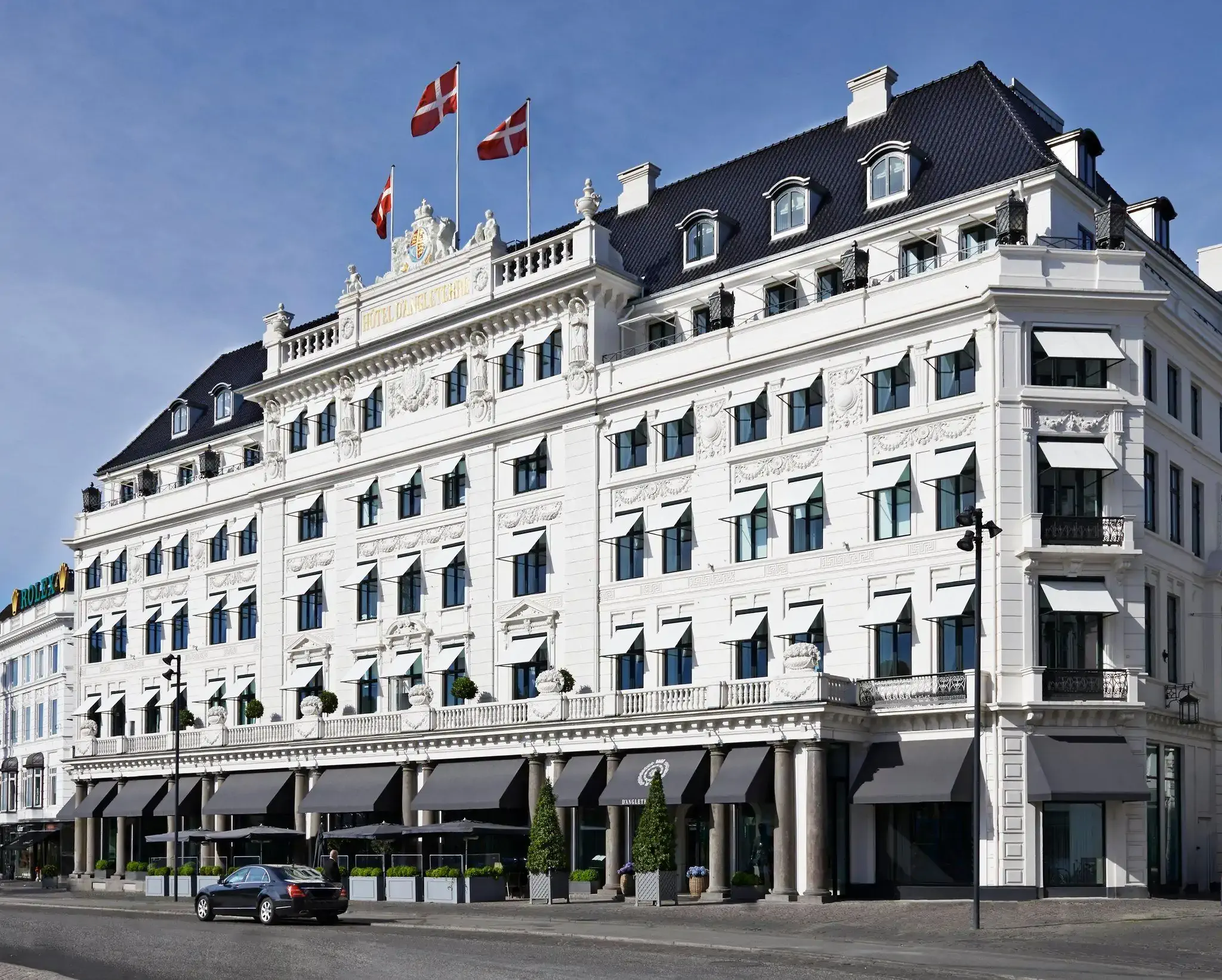 Elegant white hotel building with classic architectural details