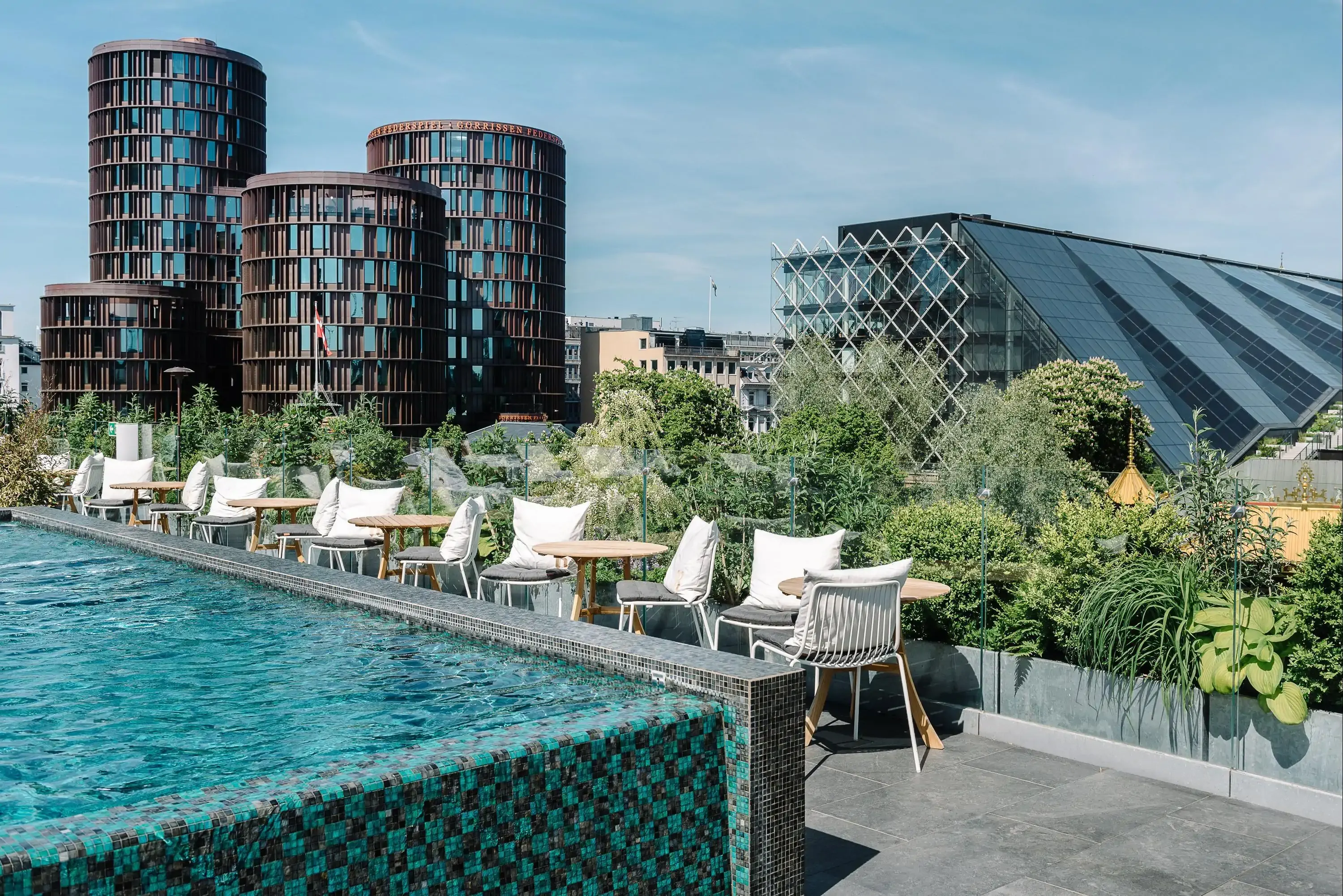 Open air pool on a rooftop of elegant hotel on a sunny day