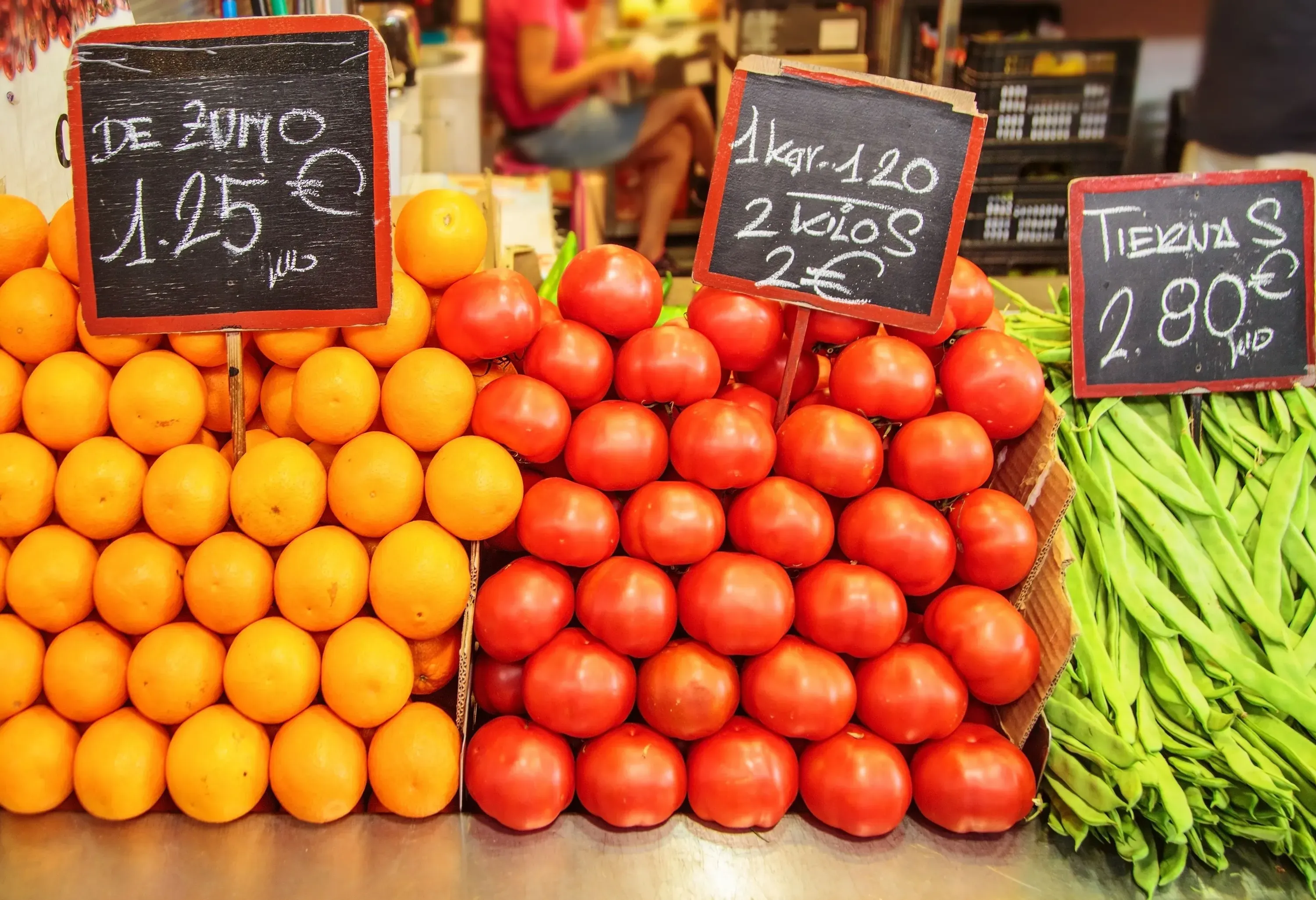Fresh and vibrant fruits and vegetables are up for sale in the market.
